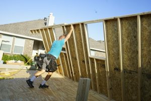 Bob the Ulrich On-Site Builder Raises a Cabin Shell Wall